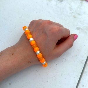 Glow in the dark orange bracelet